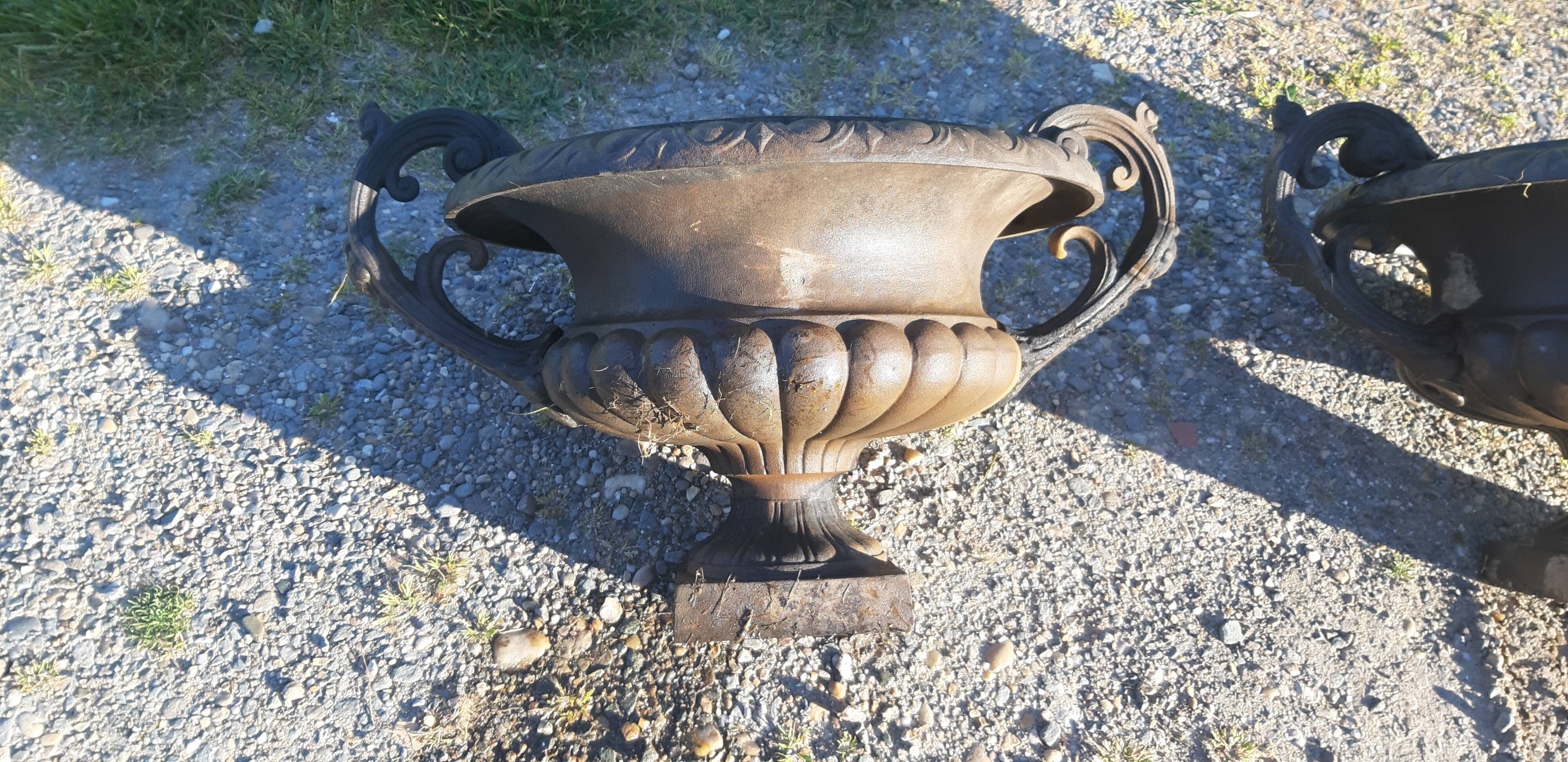 Pair of cast ear vases