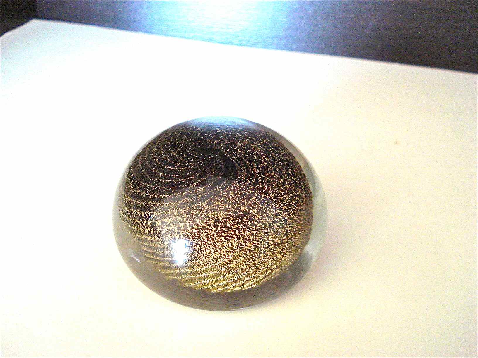 Gold spiral paper press