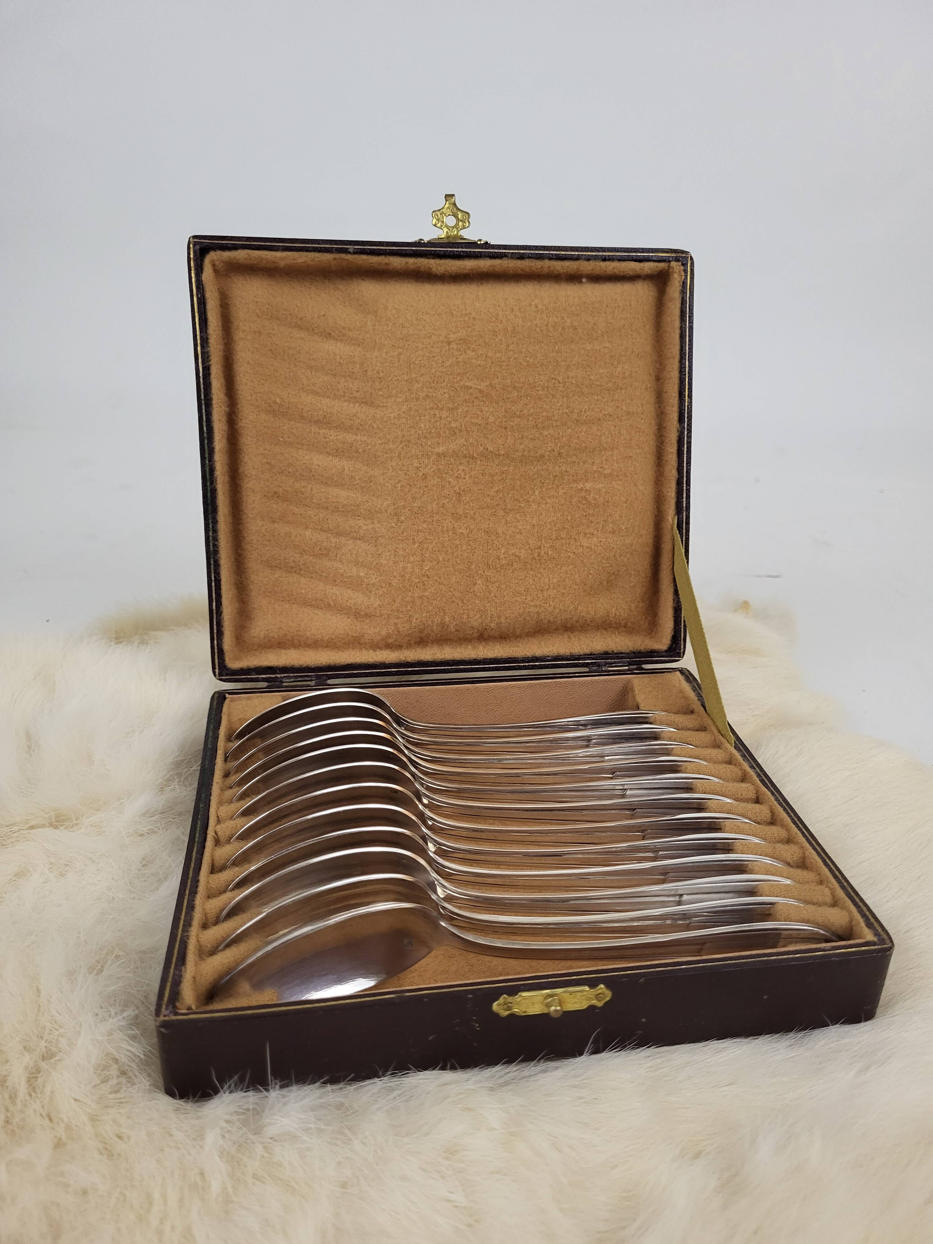 12 silver-plated metal teaspoons, Art Deco style