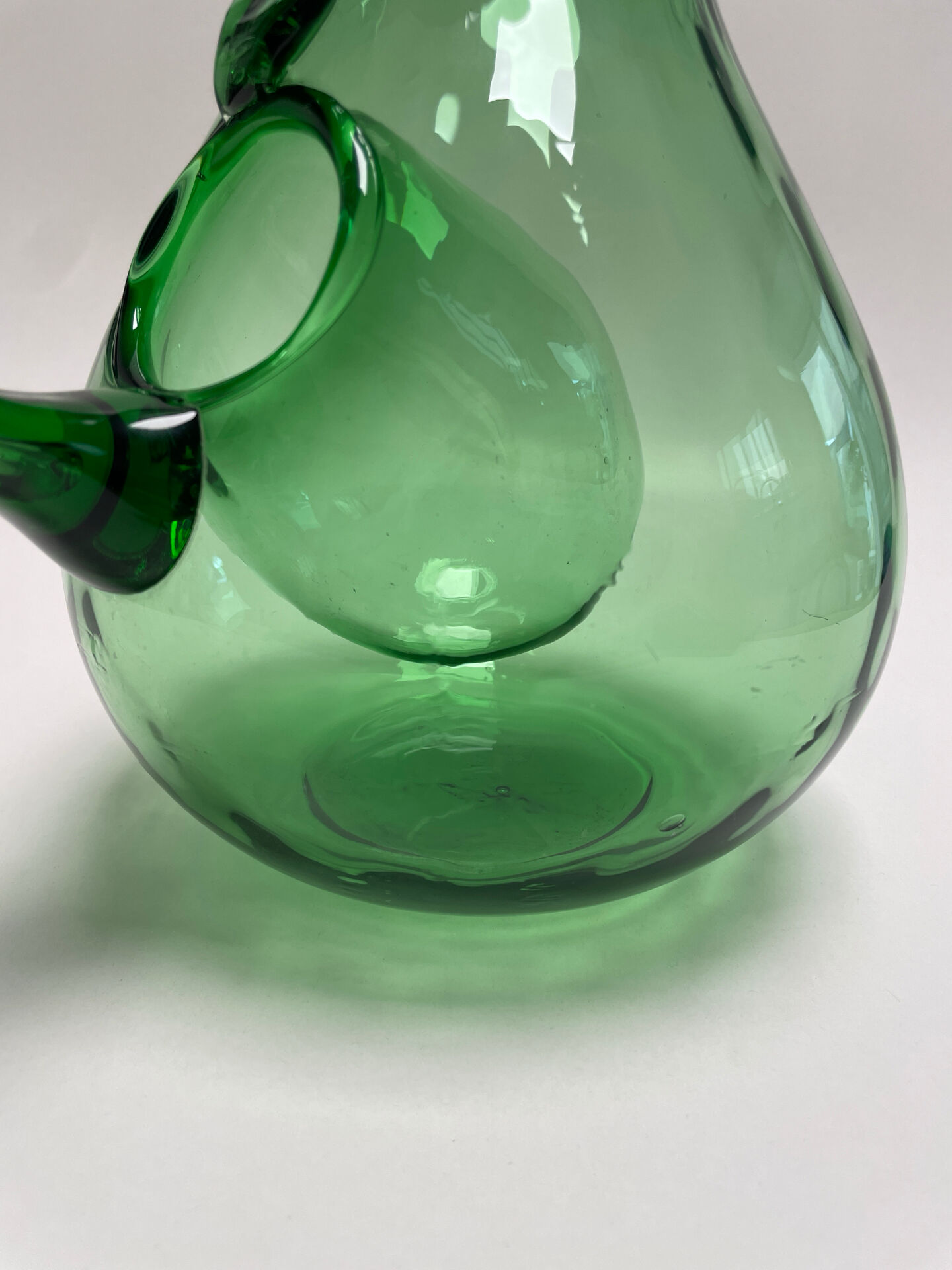 Large green glass cooling jug