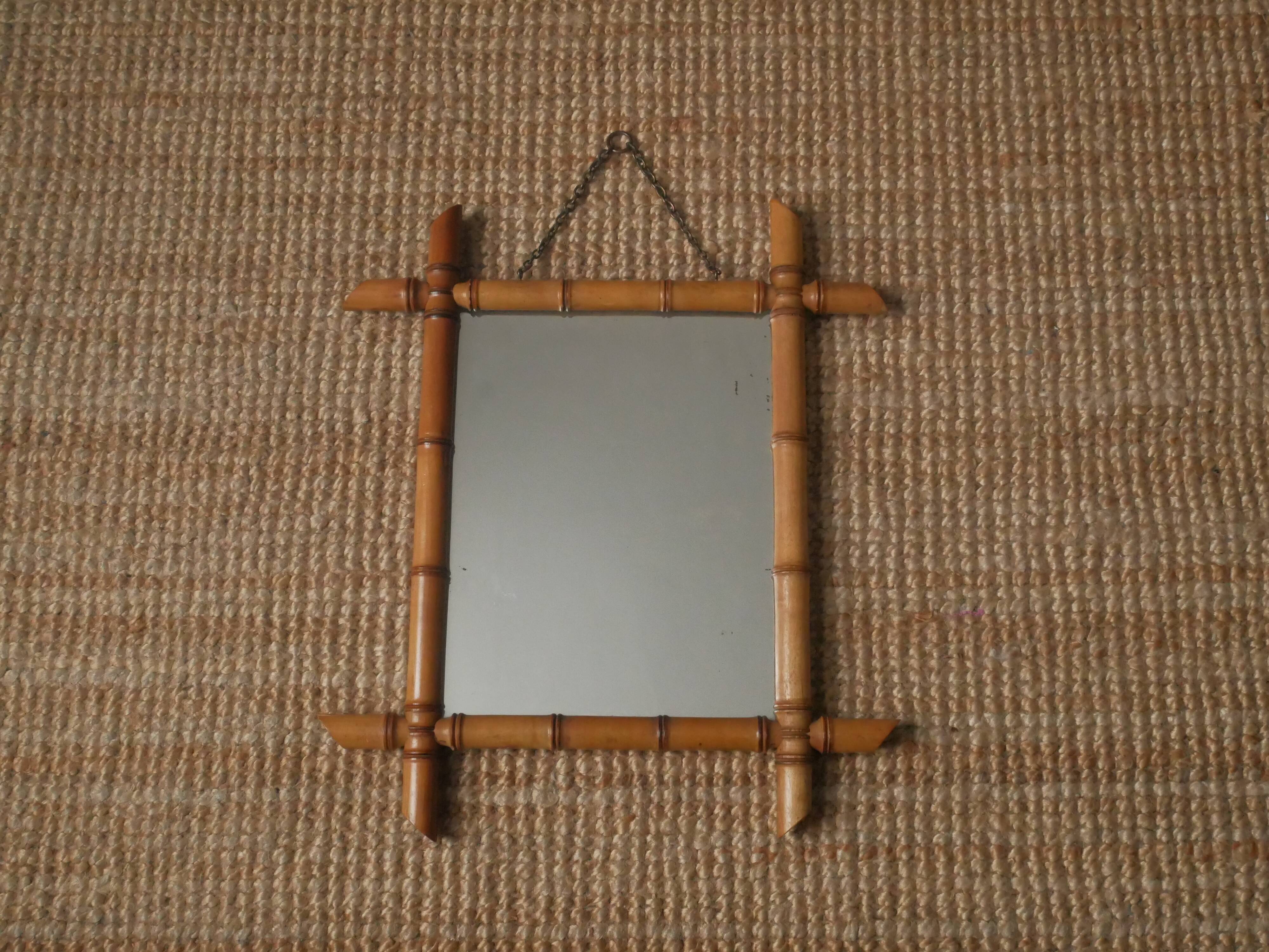Vintage bamboo wooden mirror with retro bohemian spirit