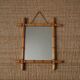 Vintage bamboo wooden mirror with retro bohemian spirit