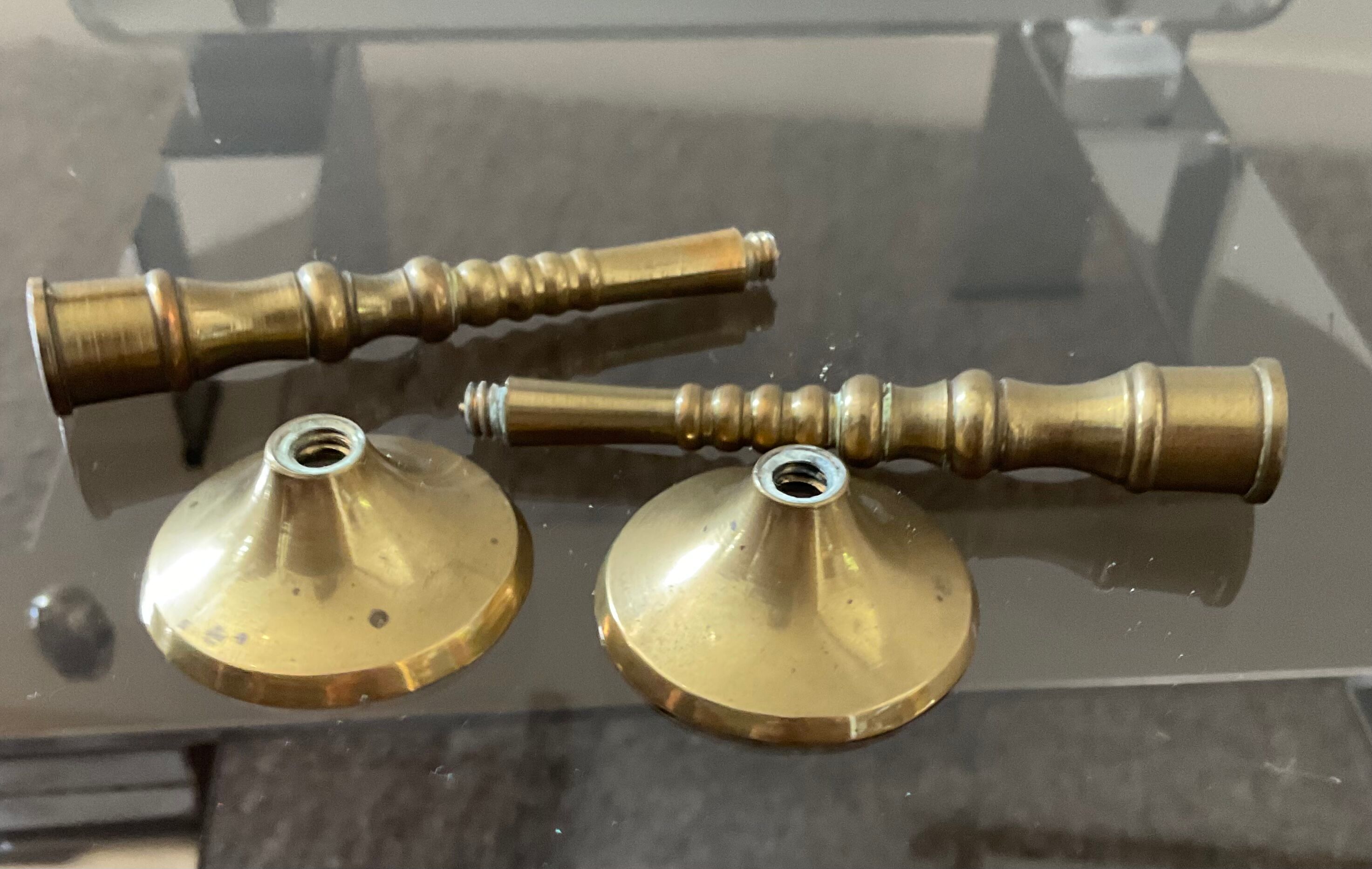 Pair of miniature bronze torches