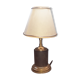 Antique lamp in black and gold metal with its lampshade