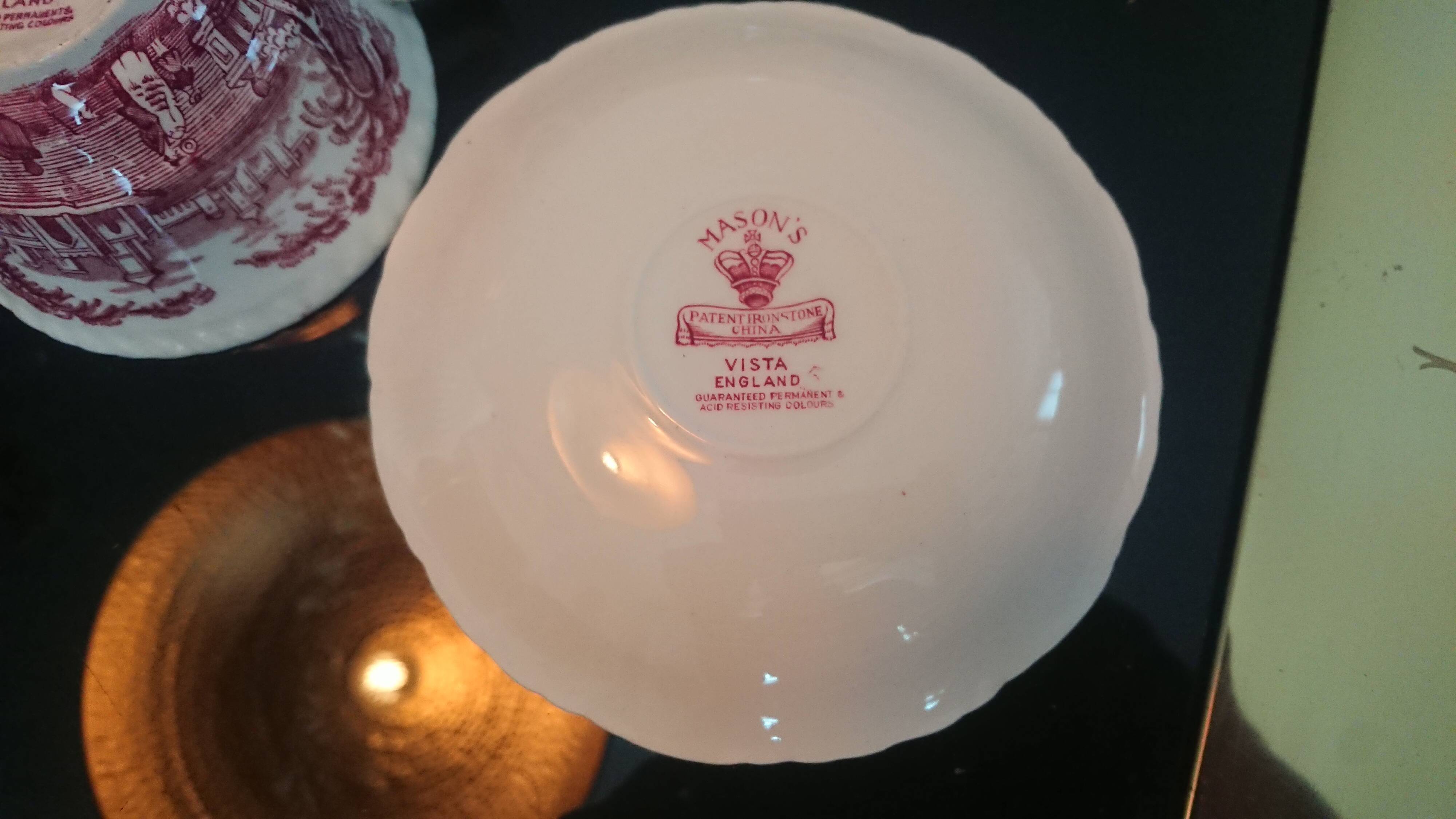 Tea cup and English earthenware saucer