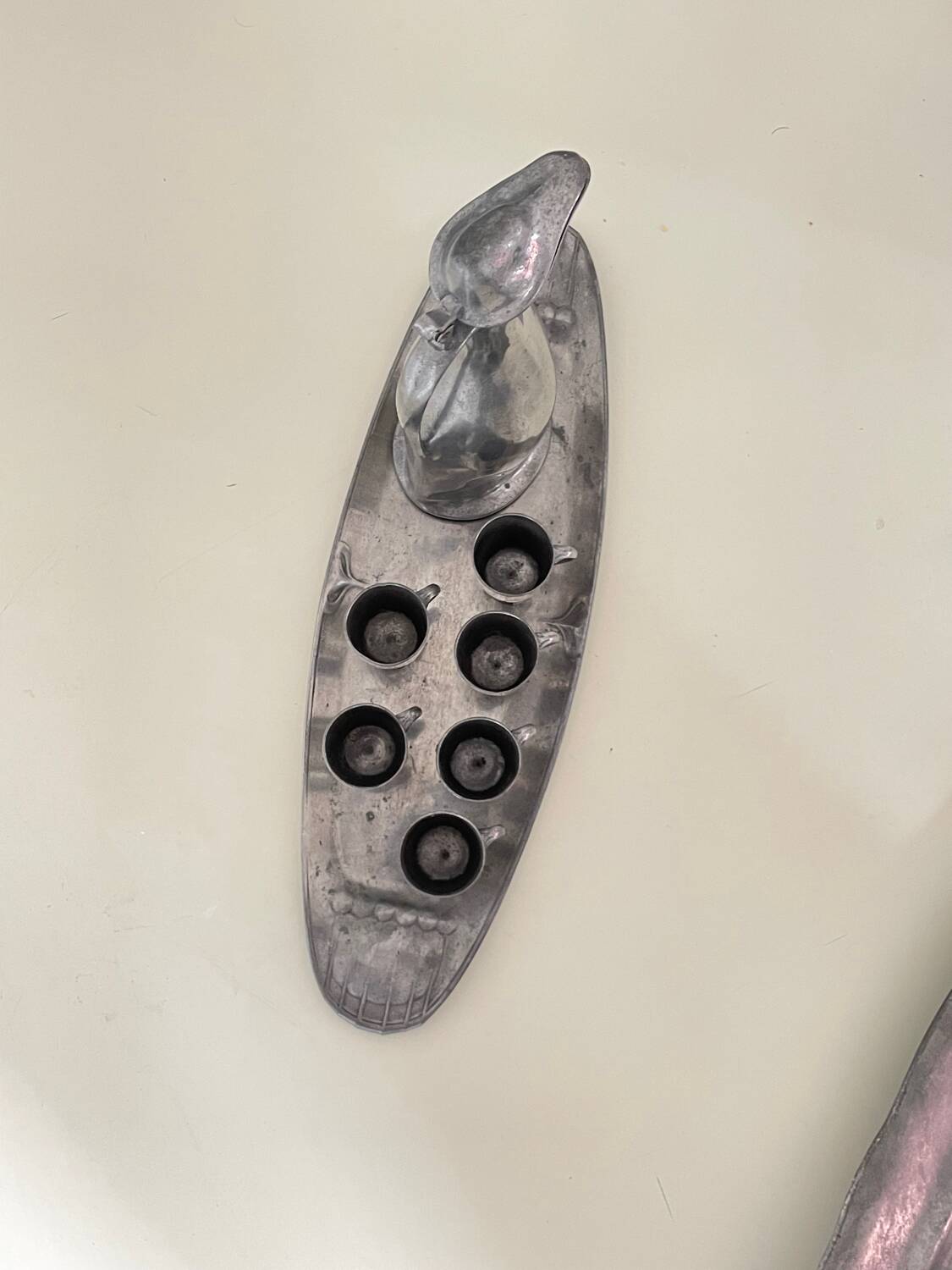 Polished pewter penguin-shaped carafe designed by Hugo Leven for Kayserzinn