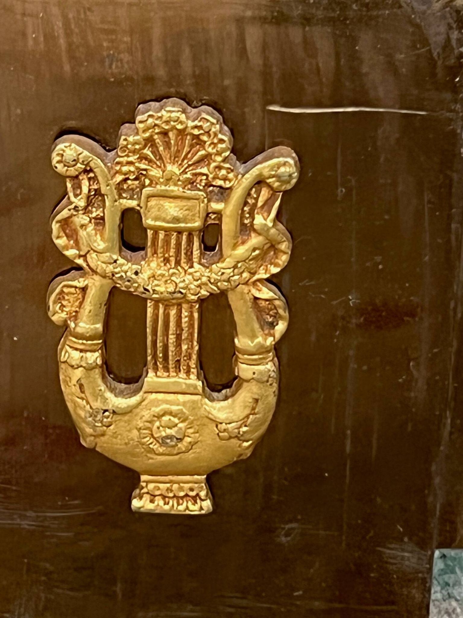 Empire-style fireplace decoration.