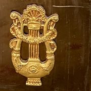 Empire-style fireplace decoration.