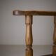 Swivel armchair in carved oak with ball bearings, early 20th century.