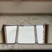 Vintage vertical beveled triptych barber mirror