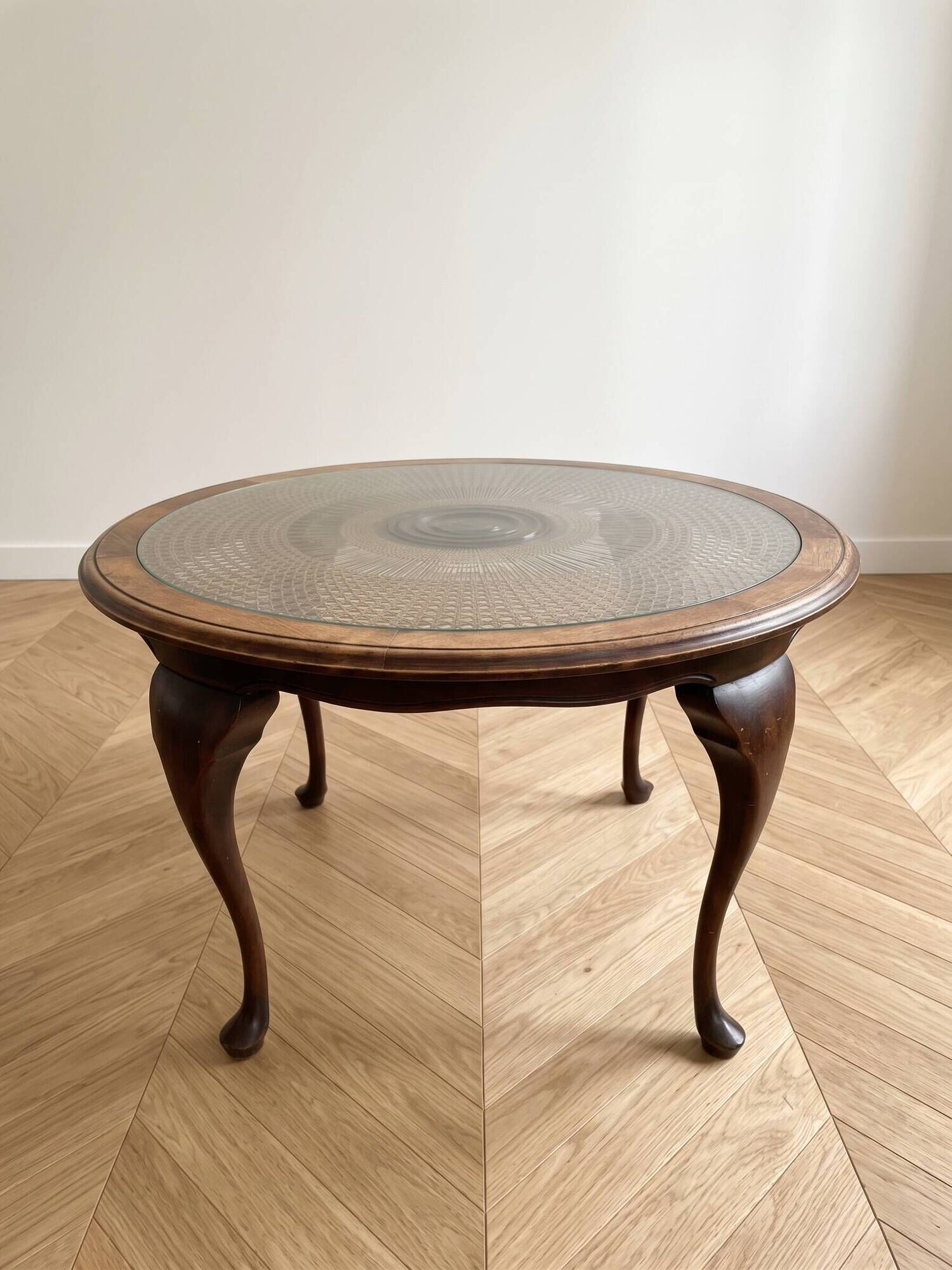 Louis XV coffee table in wood with decorative glass top.