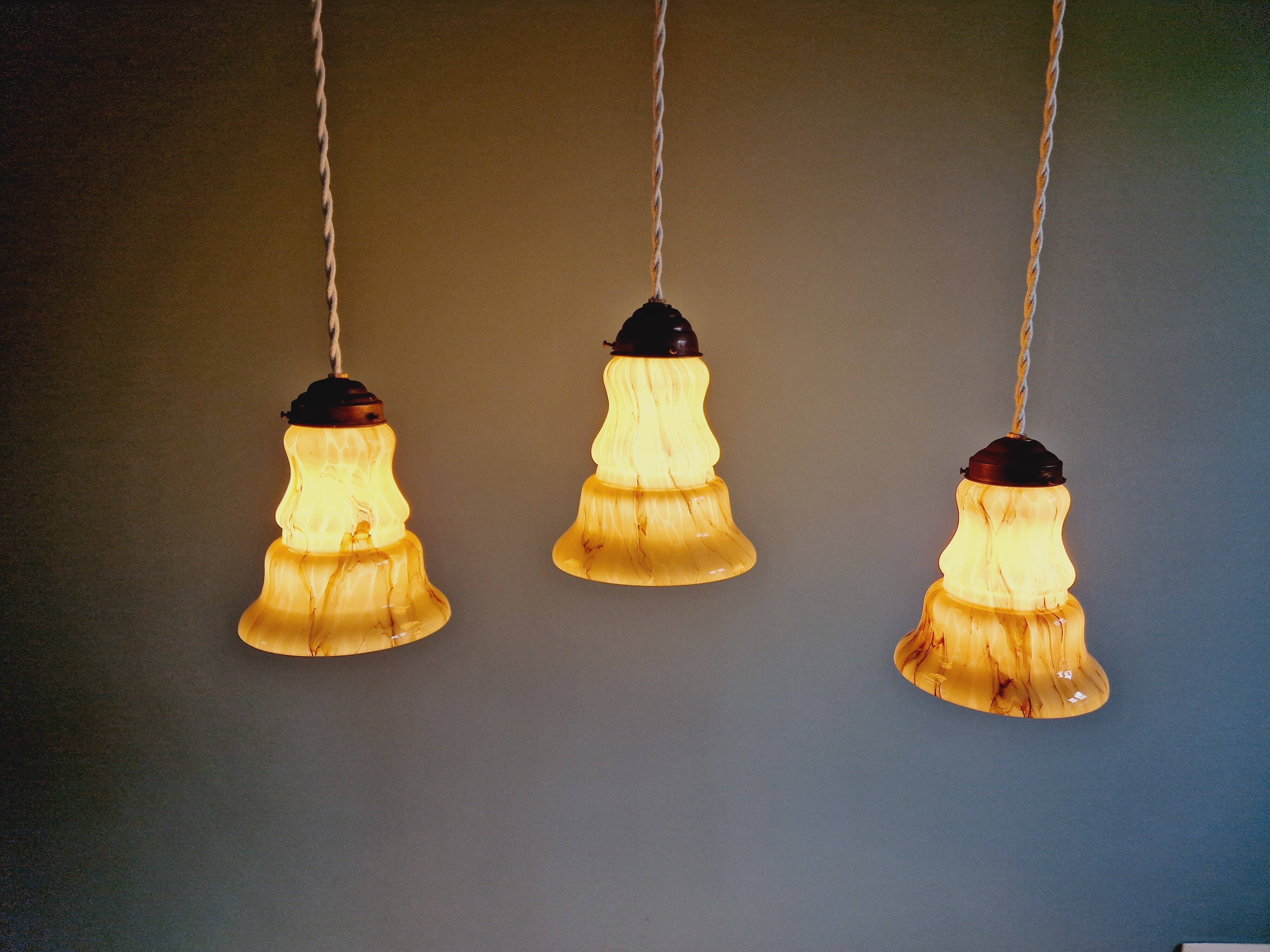 Set of 3 Art Deco marbled opaline pendant lights, 1920s-30s
