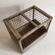 Old bird cage in wood and steel