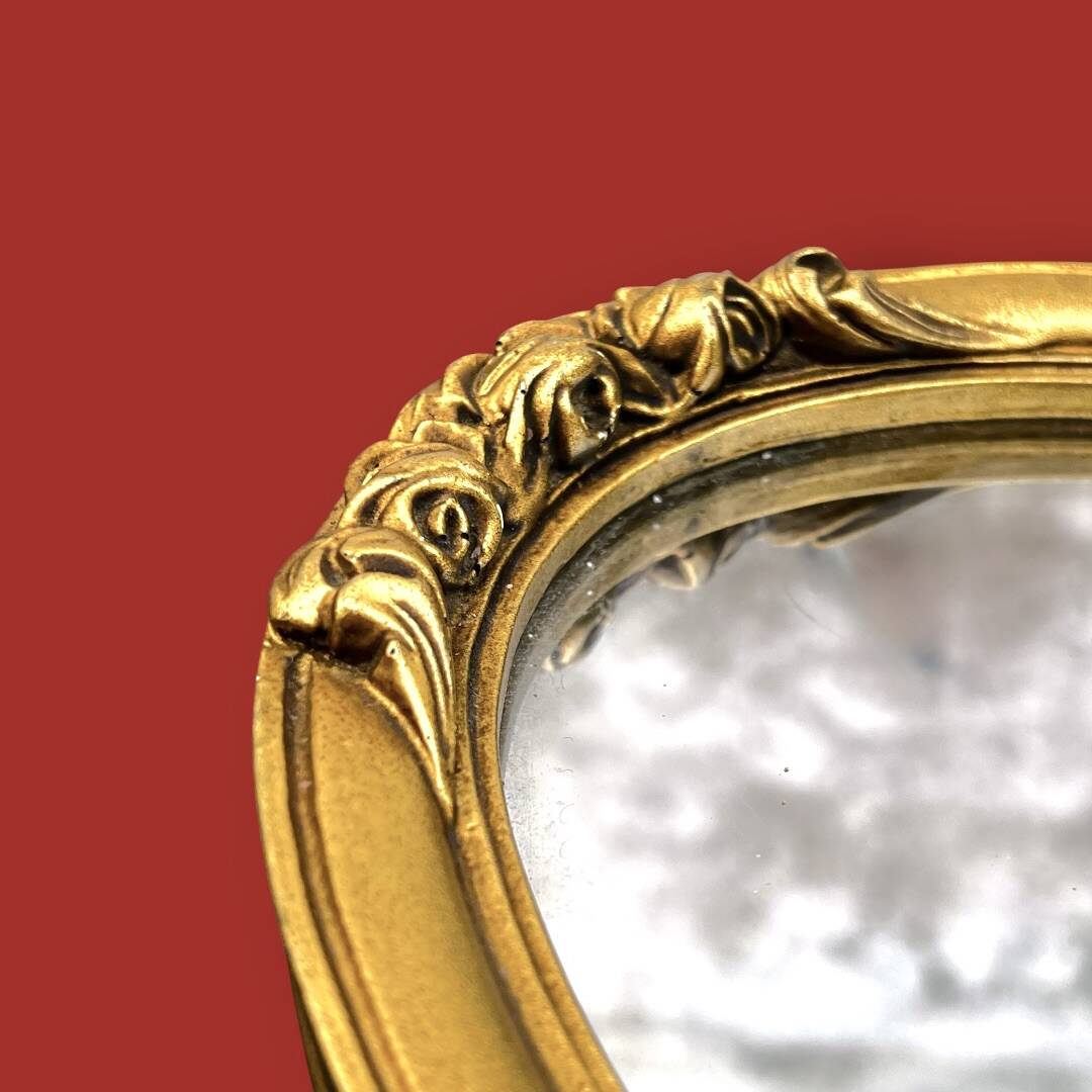 Small vintage oval mirror in gilded resin – 1960s