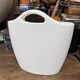 Design magazine rack in milky white by Elie Jacobson