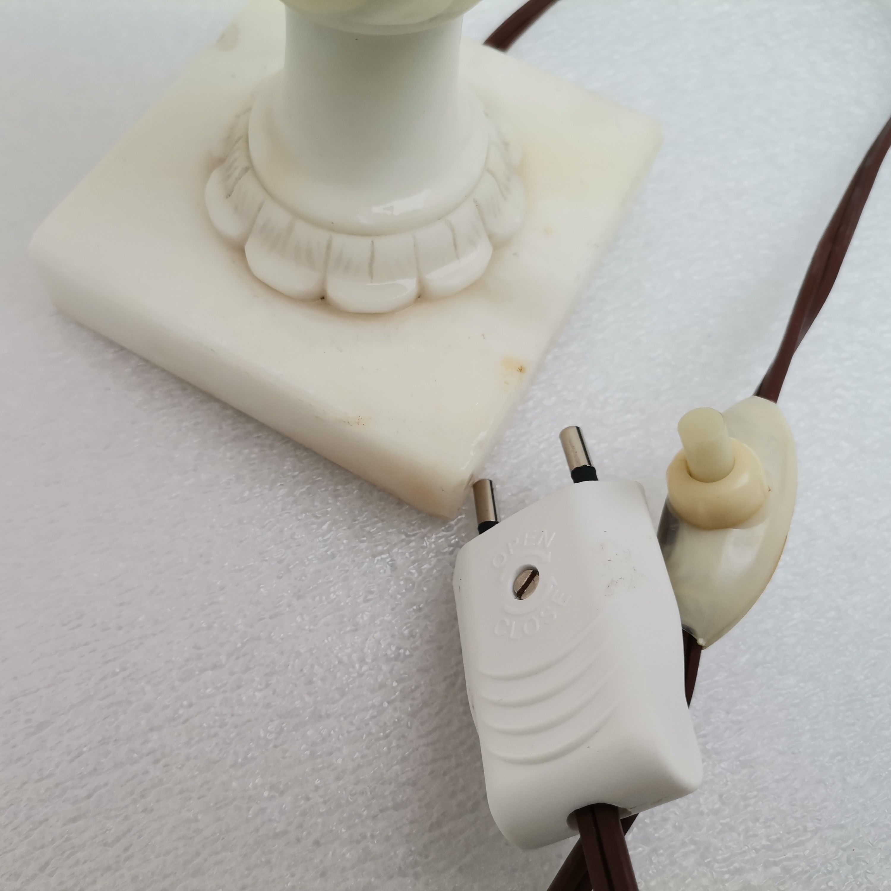 White marble amphora shaped table lamp