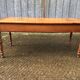 Antique farmhouse table in solid cherry wood in Louis Philippe style.