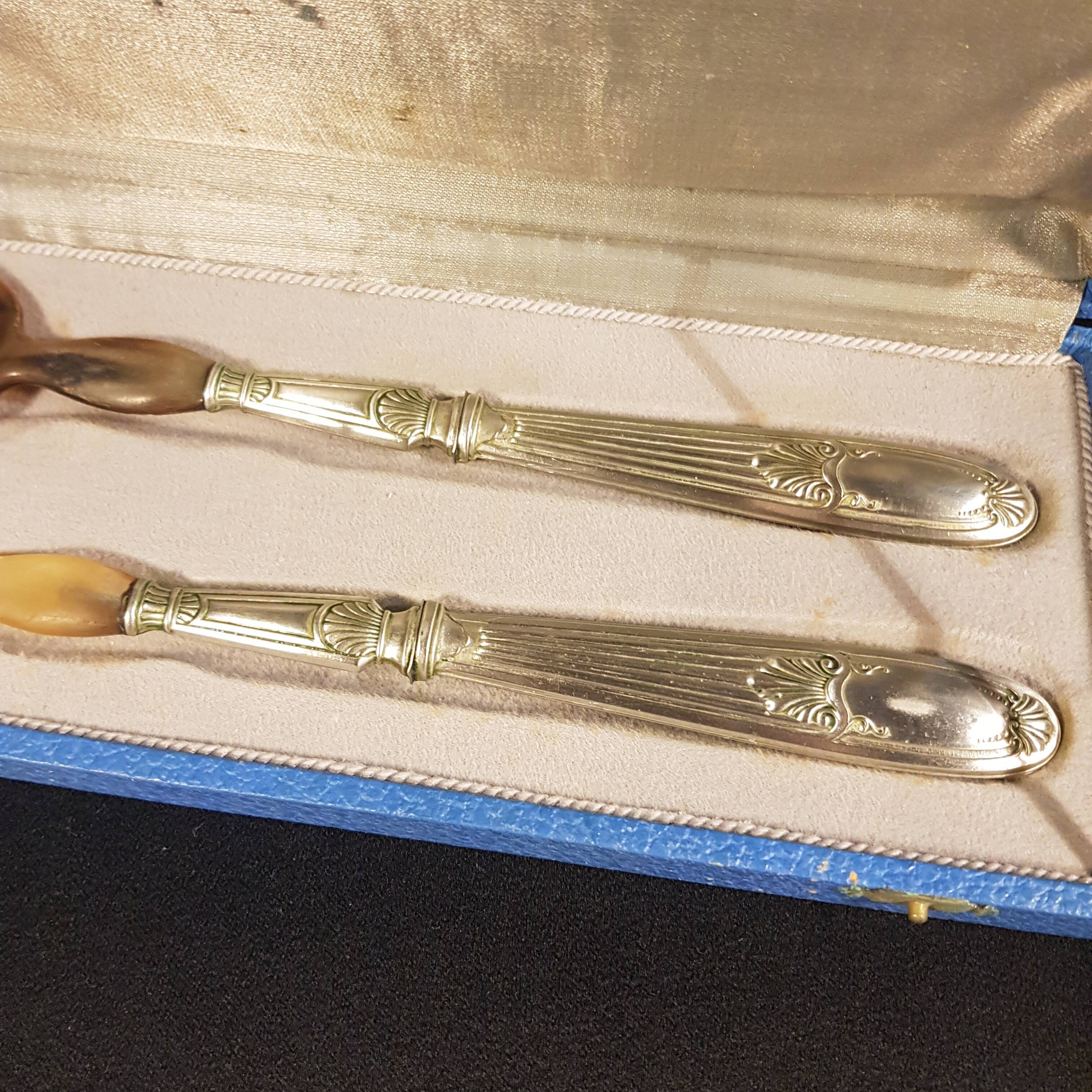 Old salad servers in their case