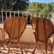 Chestnut braid armchairs from the 70s