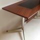 Vintage coffee table from the 1950s in mahogany and metal, with a tabletop width of 110 cm.