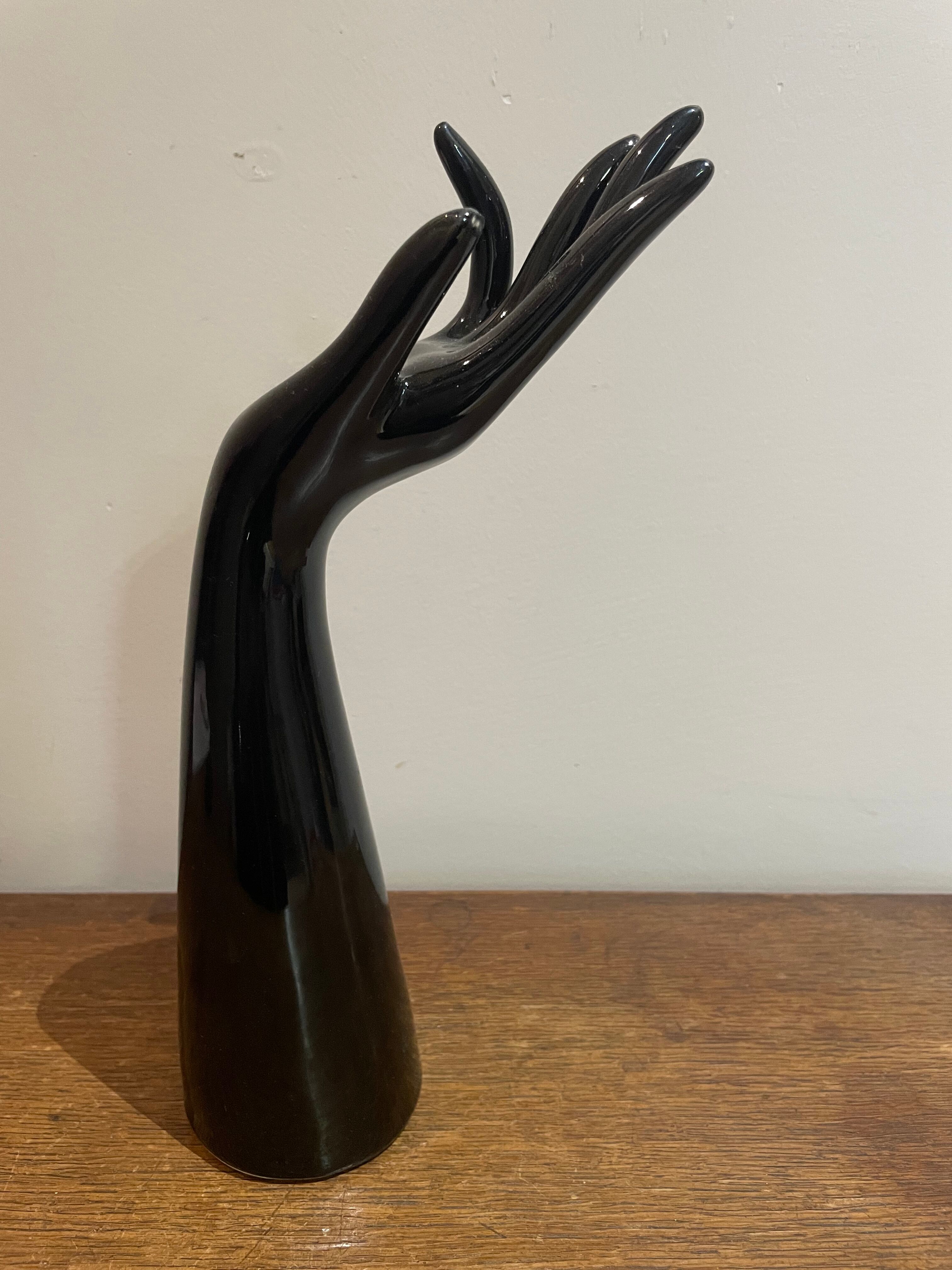 Black ceramic hand sculpture
