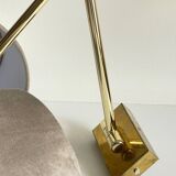 articulated brass and velvet wall light