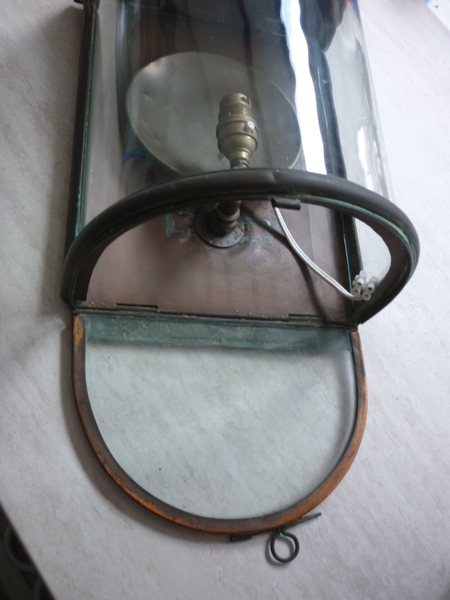 Ancient half-moon brass wall lantern