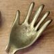 Vintage brass hand ashtray/trinket tray