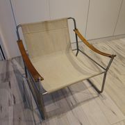 Scandinavian living room armchair in tubular chrome and leather