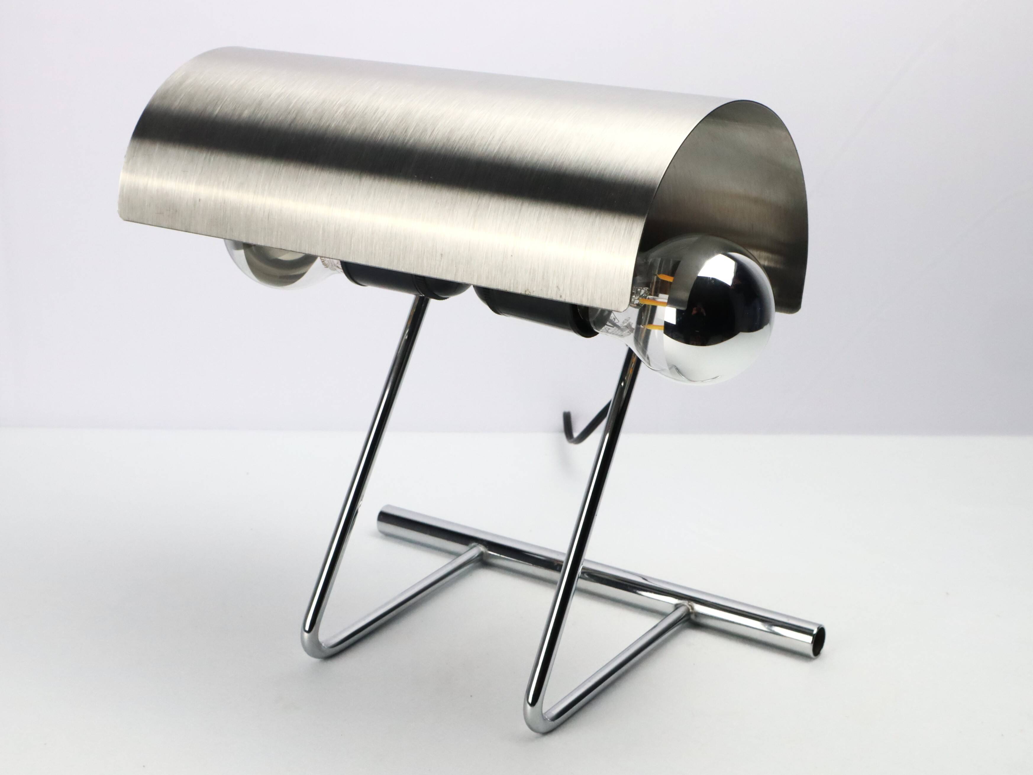 Stainless steel lamp from the 1970s in the style of François Monnet.