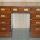 Vintage Harrods Kennedy desk in military campaign style with drawers.