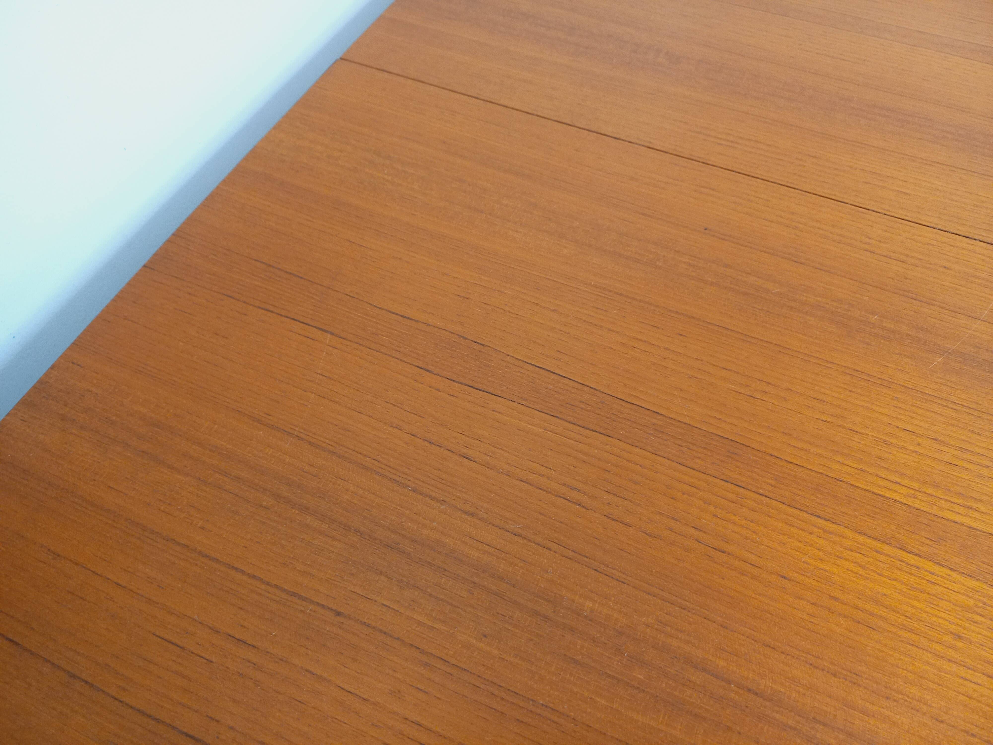 Rectangular dining table in vintage Scandinavian style from the 50s and 60s, made of teak.