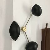 Sculptural wall sconce 3 black arms