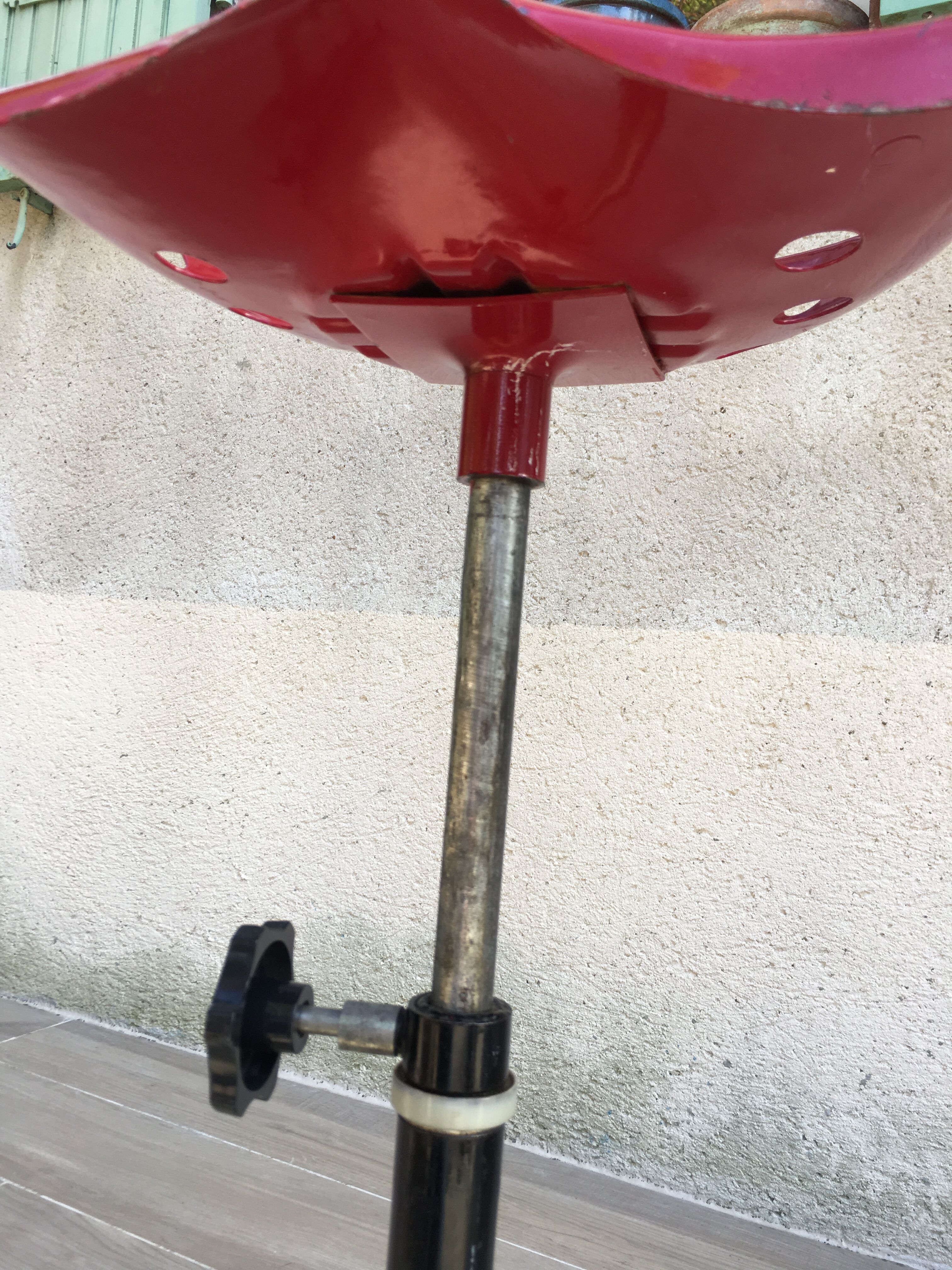 Vintage high stool sitting tractor