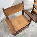 Pair of leather and walnut armchairs from the 1950s