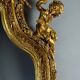 Large Louis XV style mirror in carved and gilded wood, 19th century