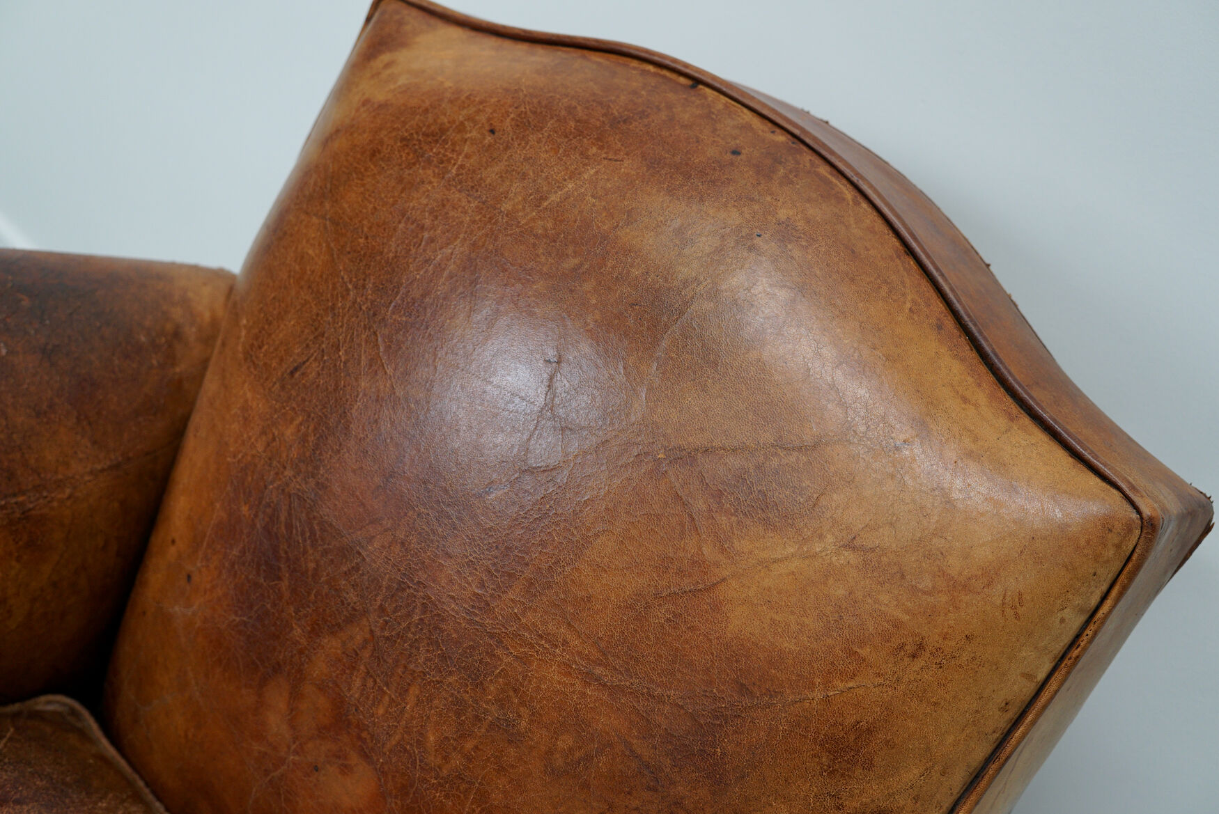 French moustache back cognac-colored leather club chair, 1940s