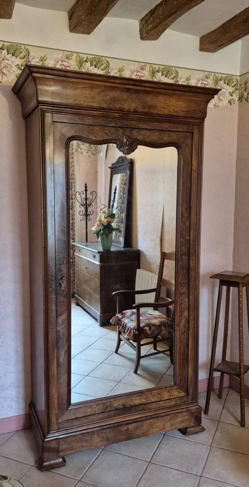 Antique wardrobe with one door and mirror.