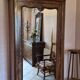 Antique wardrobe with one door and mirror.