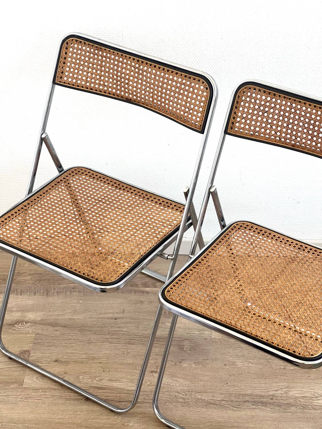 Pair of folding cane chairs