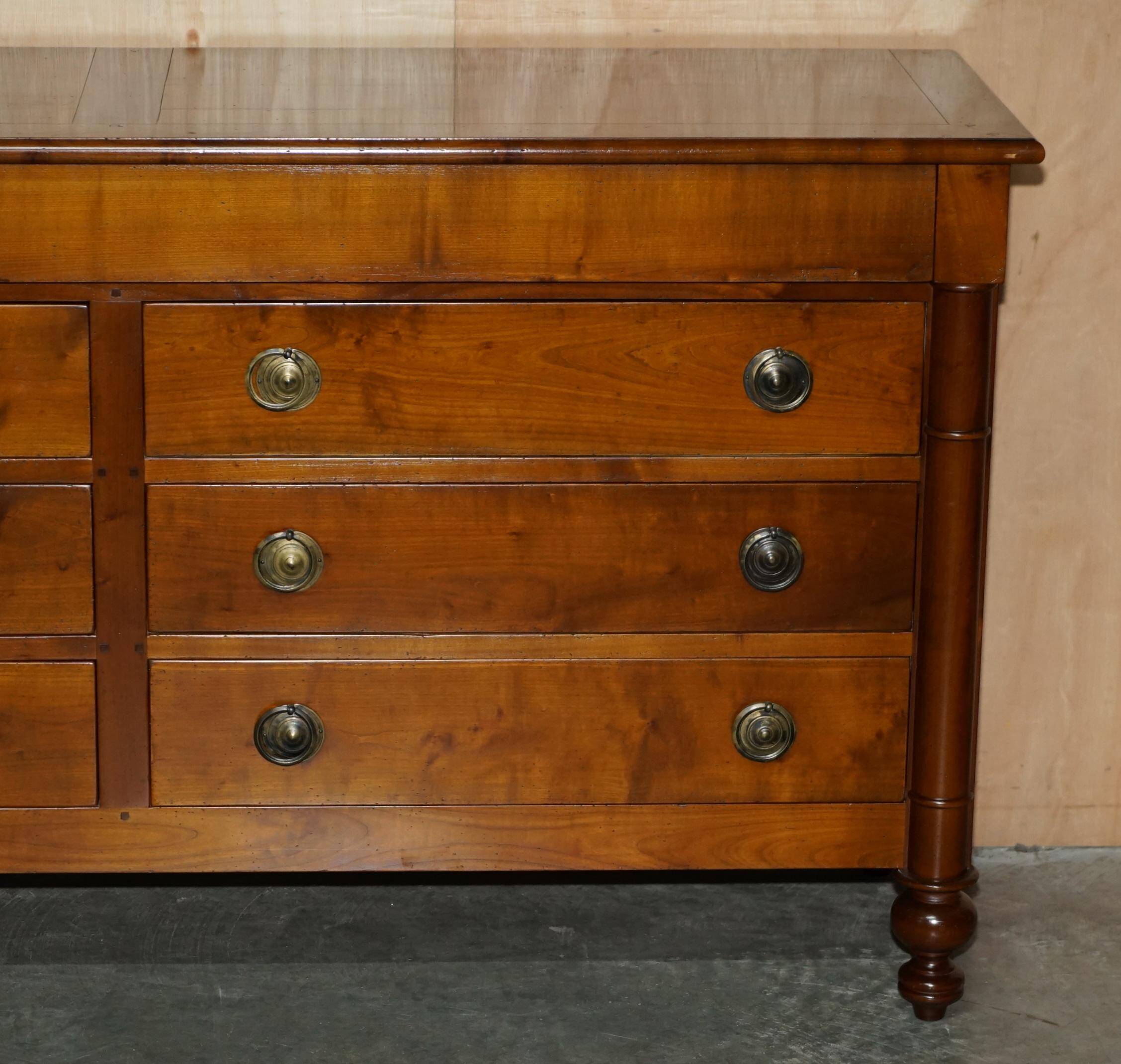 Vintage low cabinet from Grange made of cherry wood.