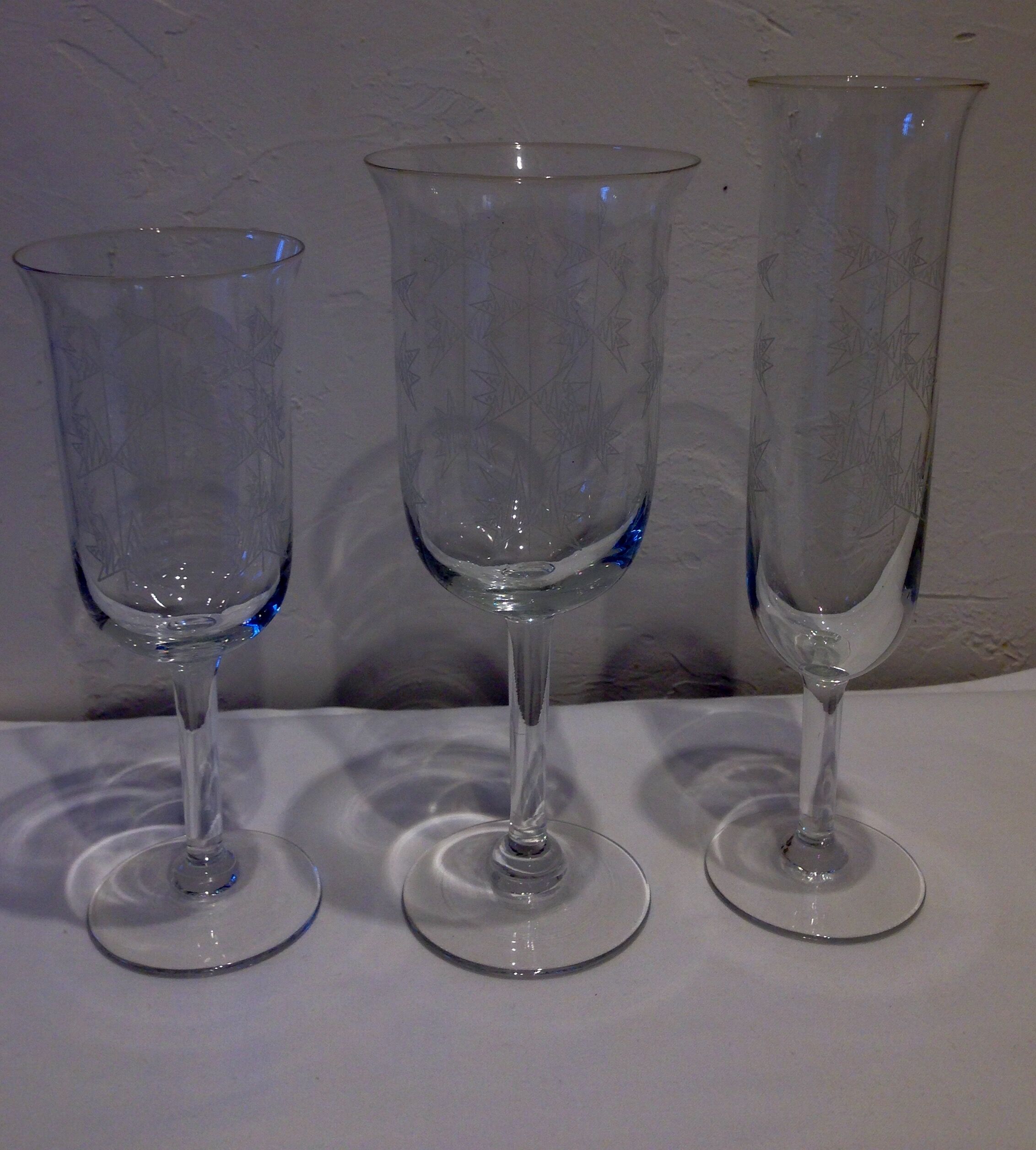Serious old lenses / wine / water glasses / champagne flutes