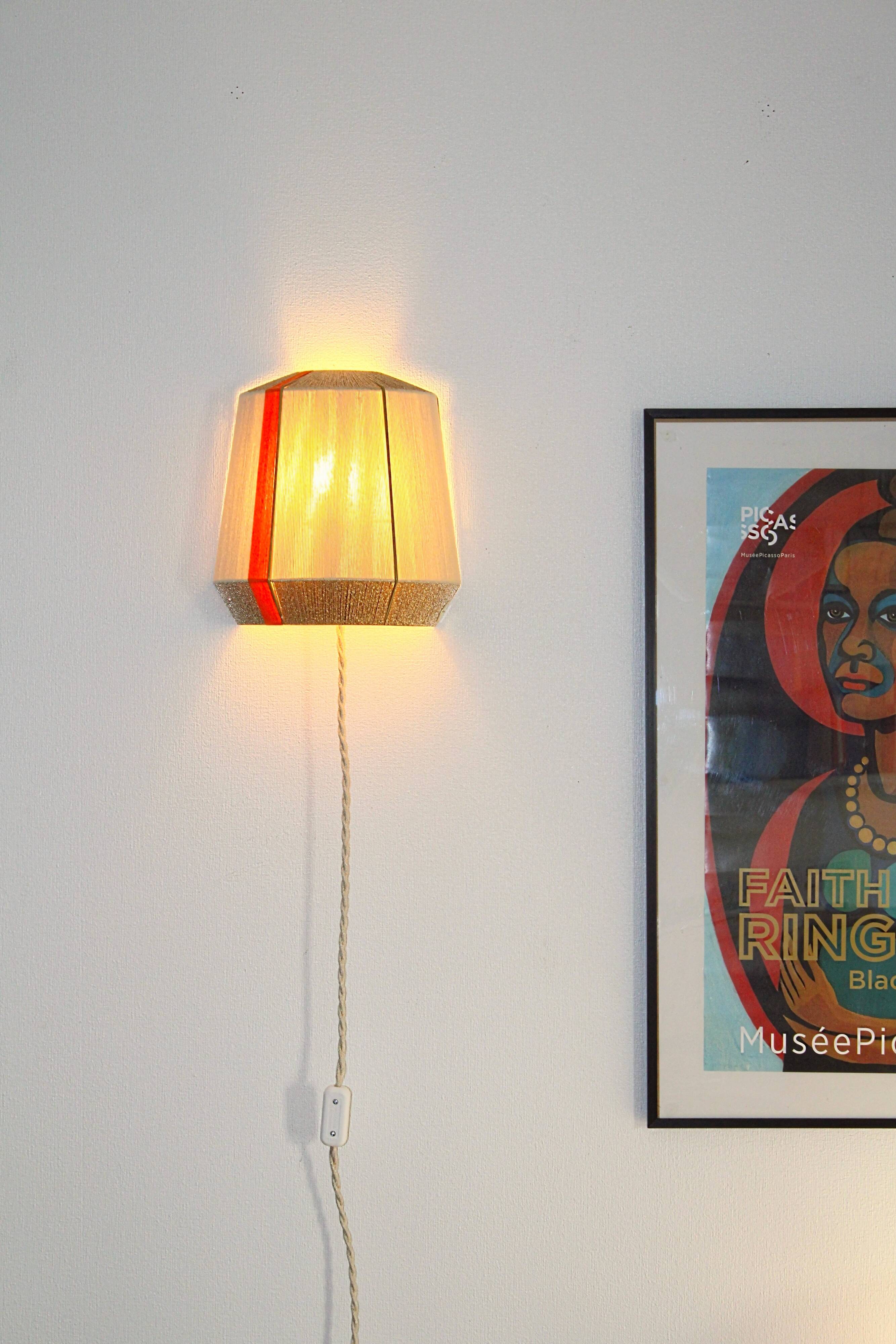 Colourful wall lamp L’Epicurienne gold – orange