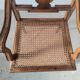 Fauteuil canné en bois naturel
