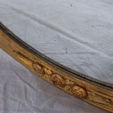 Art Deco golden oval mirror