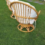 Pair of swivel rattan armchairs