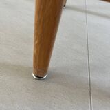 Vintage stool from the 60s with aged leather seat