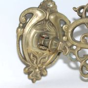 Pair of wall candle holders in brass