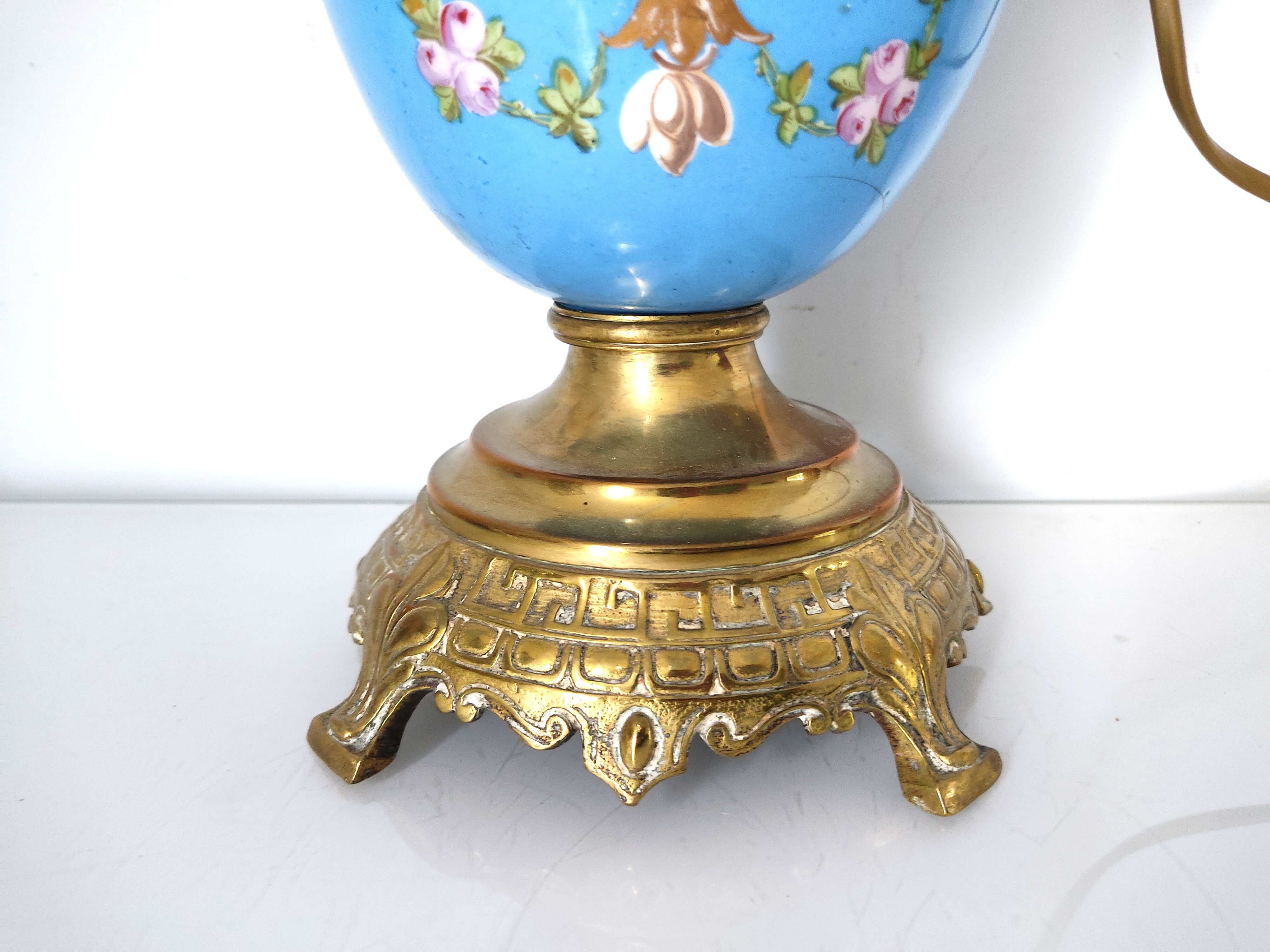 Lamp foot blue vase heads of fauna