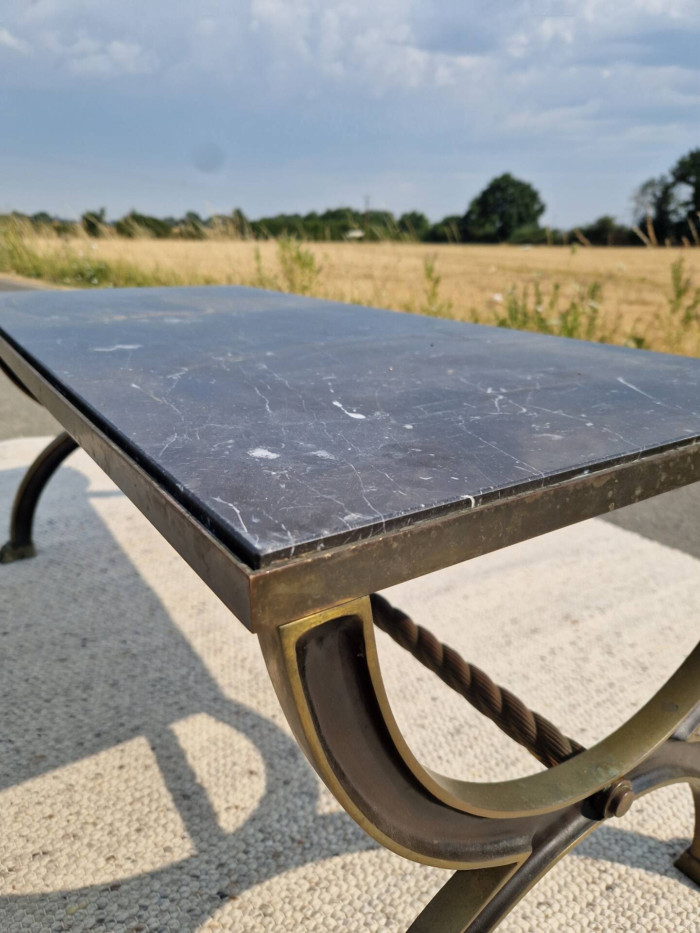 Low tables with marble tops in Neoclassical style.